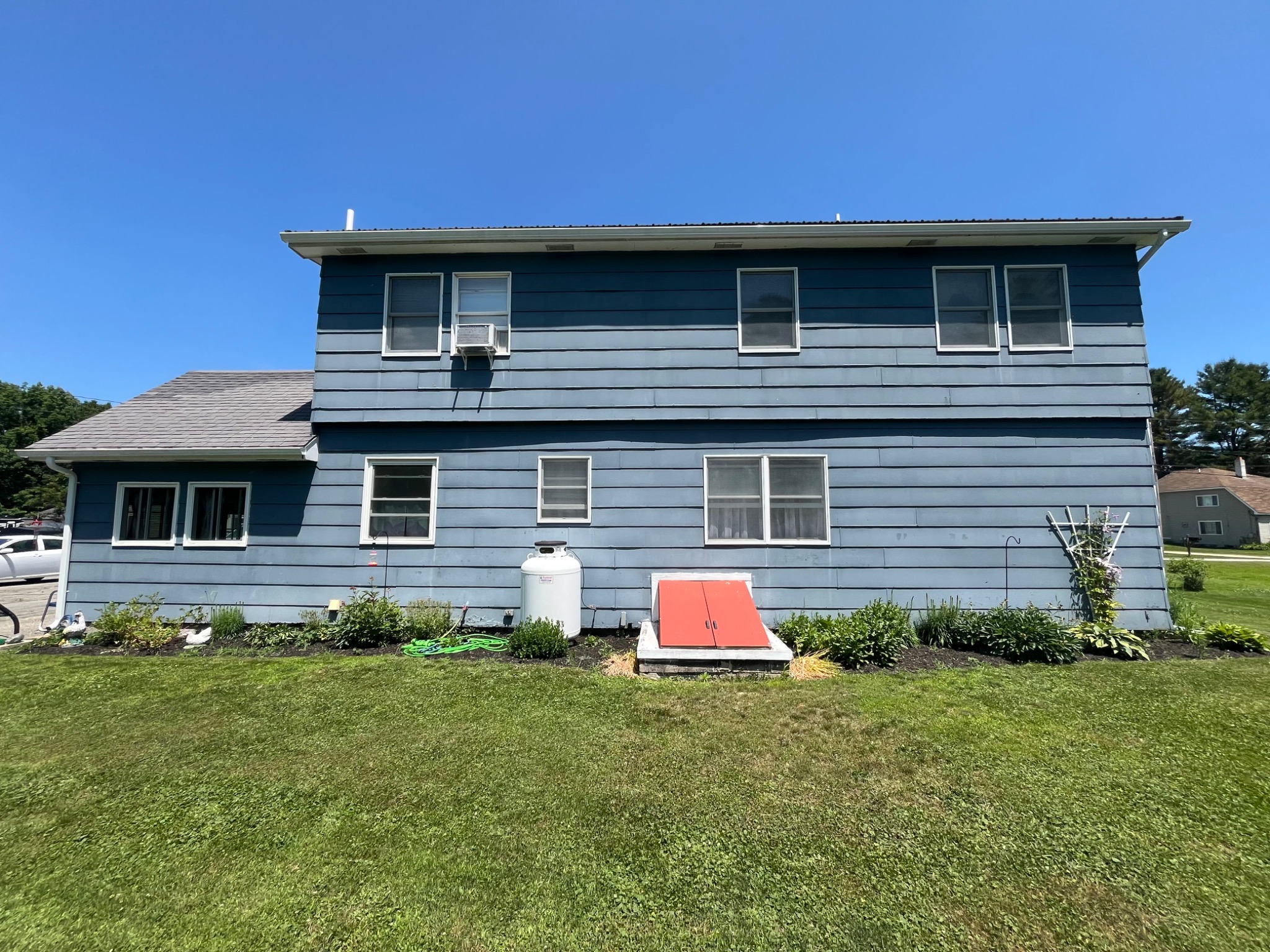 Before siding project in Saco Maine